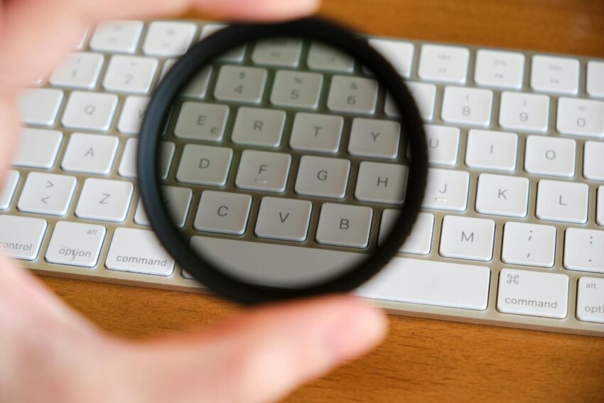 Creative close-up of a computer keyboard viewed through an ND filter, showcasing unique perspective.
