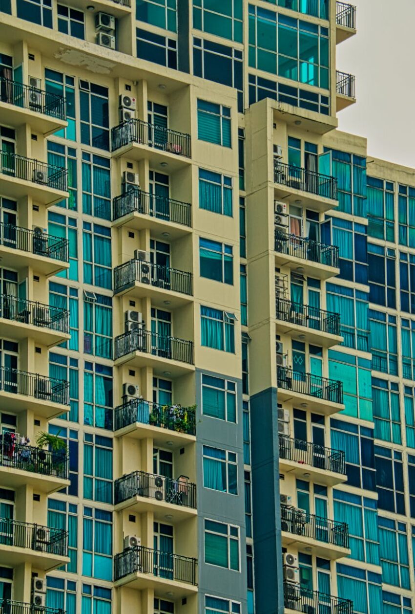 Contemporary multi-storey building in Jakarta featuring geometric patterns and balconies.